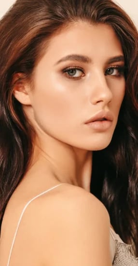 Woman with a balanced, natural chin and jawline in profile