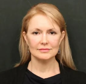 Front view of a woman showing the jawline and the corners of the mouth