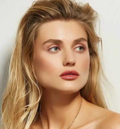 Woman with smooth, natural-looking skin after injectable treatment