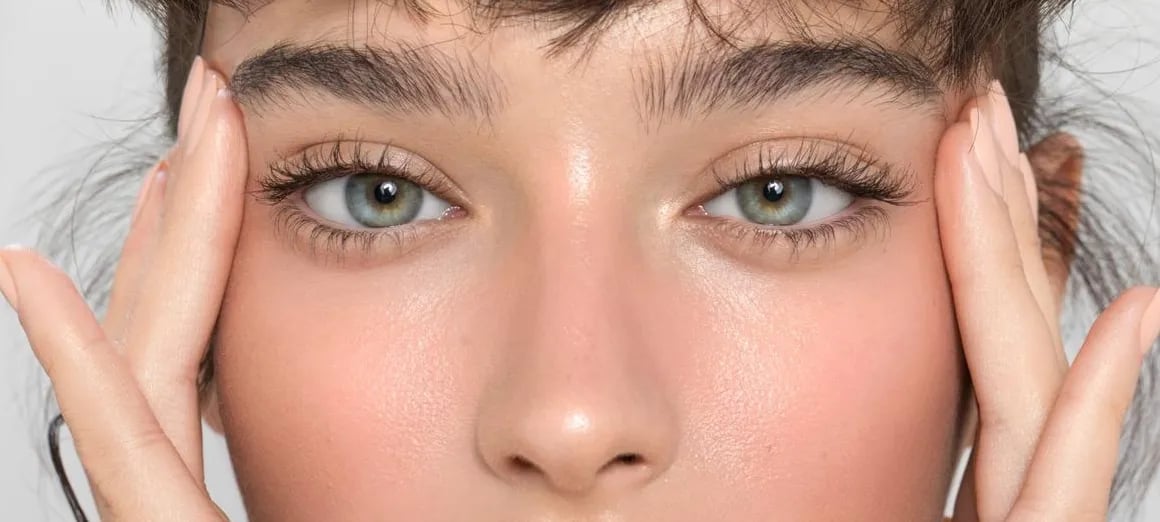 Close view of the under-eye area showing puffiness and shadowing
