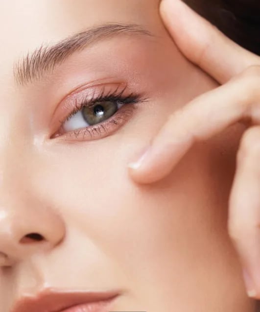 Patient examining the lower eyelid and tear trough