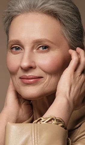 Woman with firm, smooth skin after non-surgical skin tightening